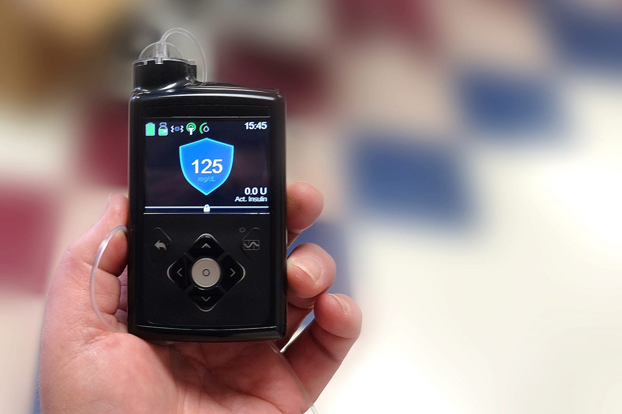 Image of Person holding Hybrid Closed Loop Technology for Type 1 Diabetes